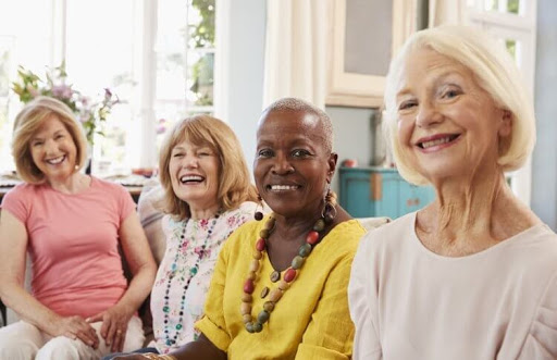 ladies smiling on couch